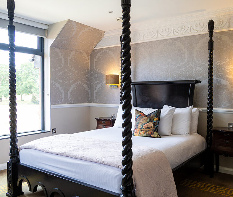 Four Poster Feature Bedrooms with Jacuzzi Bath at Guildford Manor Hotel